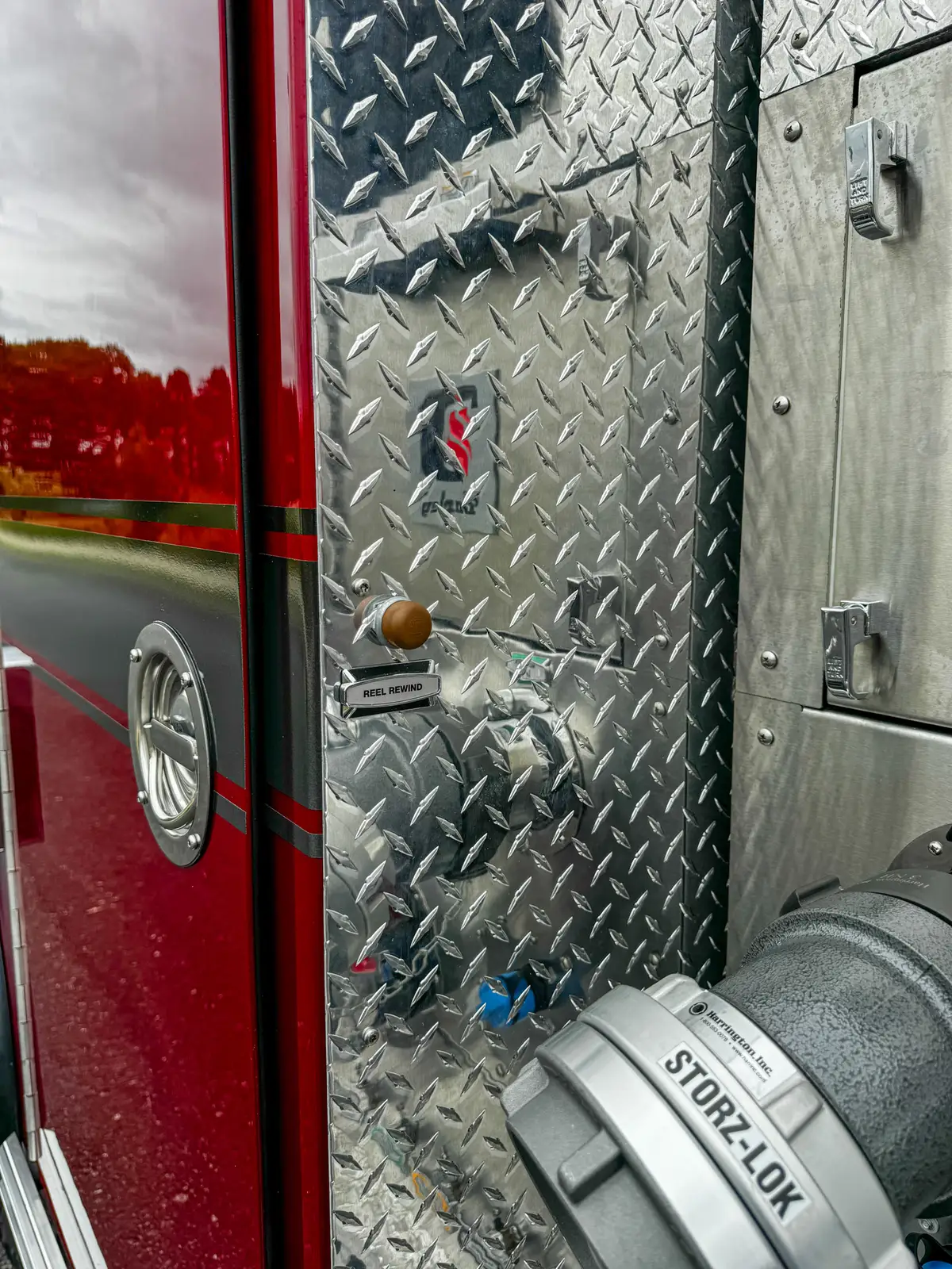Front-right three-quarter exterior view showing grille guard and front wheel.